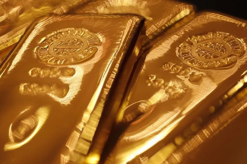 GOLD IS AROUND A TWO-MONTH HIGH AS TREASURY BUYBACKS PUSH YIELDS AND THE CURRENCY LOWER.
