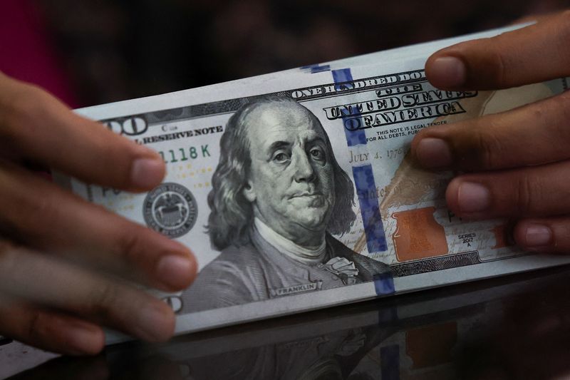THE DOLLAR WOBBLES AS MARKETS REJECT THE US TREASURY'S RESCUE MEASURES.